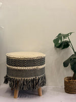 Boho‑Chic Black‑White Woven Ottoman with Fringe & Wooden Legs