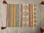 Vibrant Tribal Stripe & Geometric Medallion Cushion Cover with Red Tassel Accents