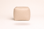 Beige Leatherette Footstool with Beans – Timeless Luxury Ottoman