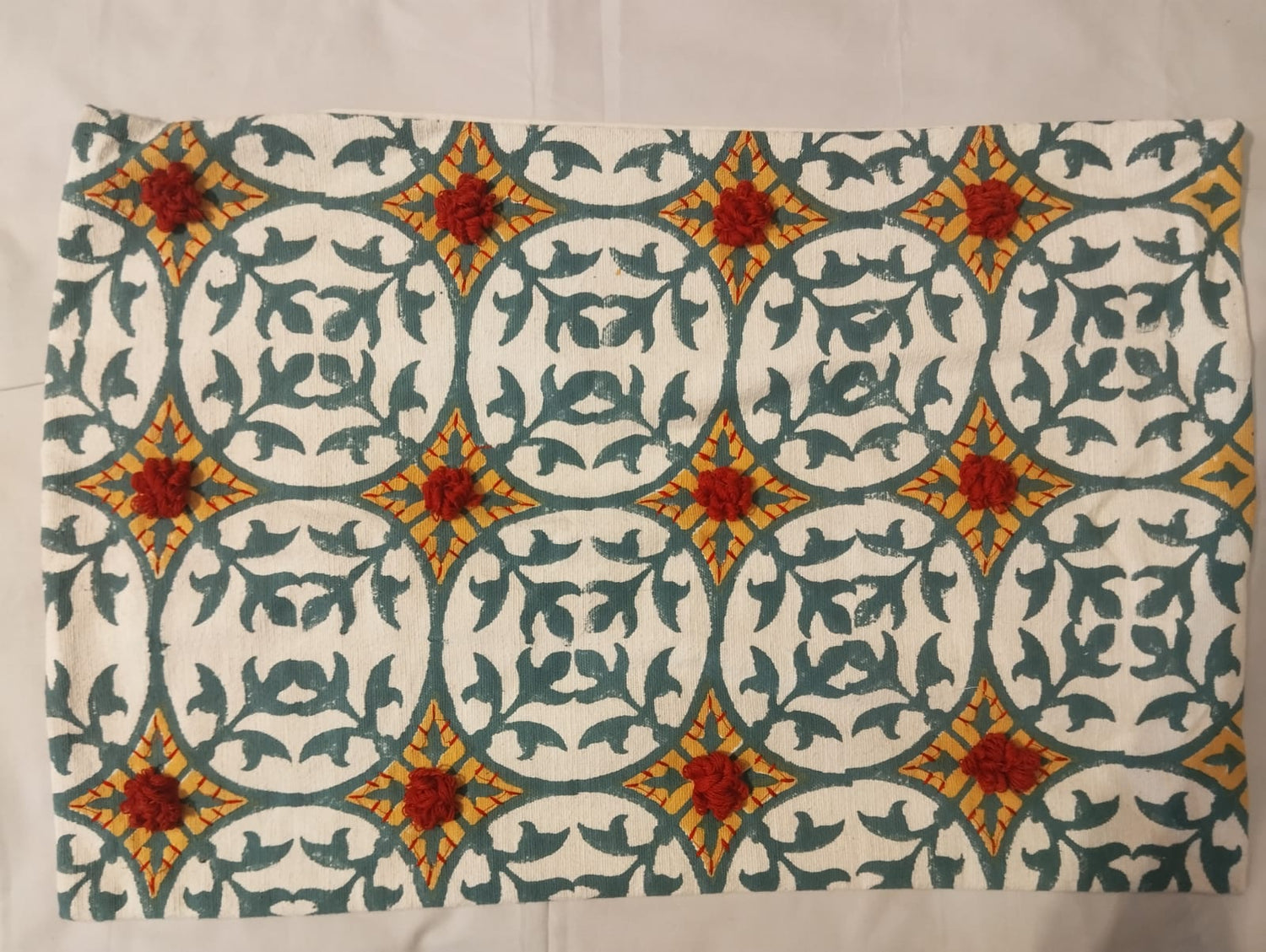 Teal & Gold Lattice with Red Pom‑Pom Accents