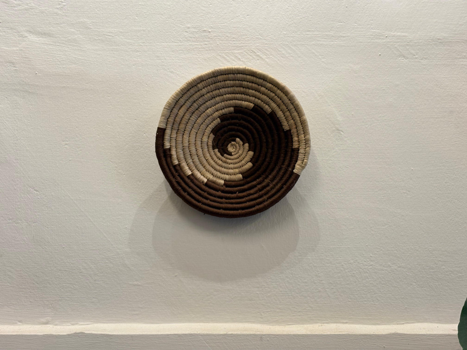 Earth‑tone Spiral Sabai Grass Wall Hanging