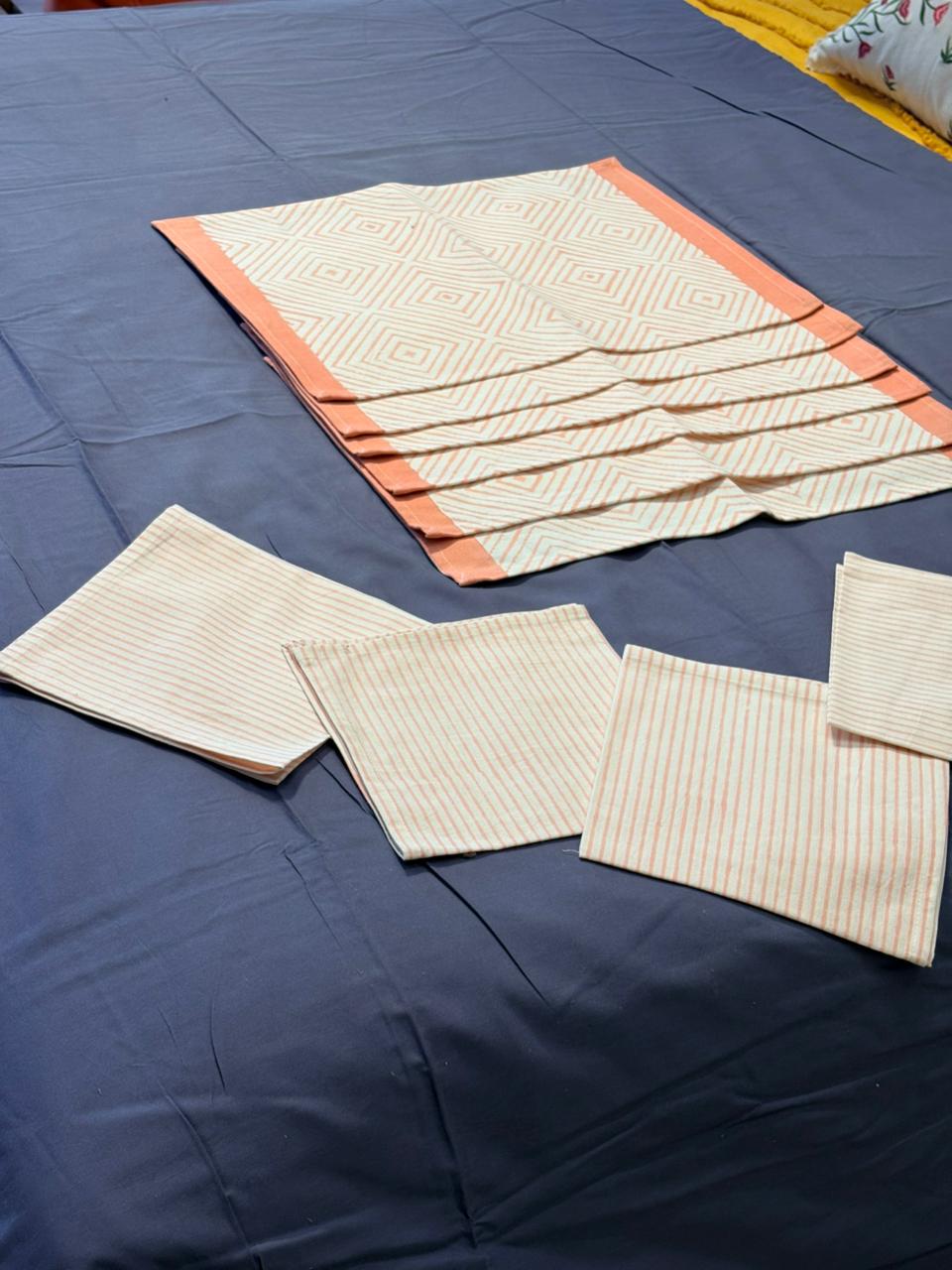 Peach‑Striped Elegant Napkin Set with Geometric Border Accent