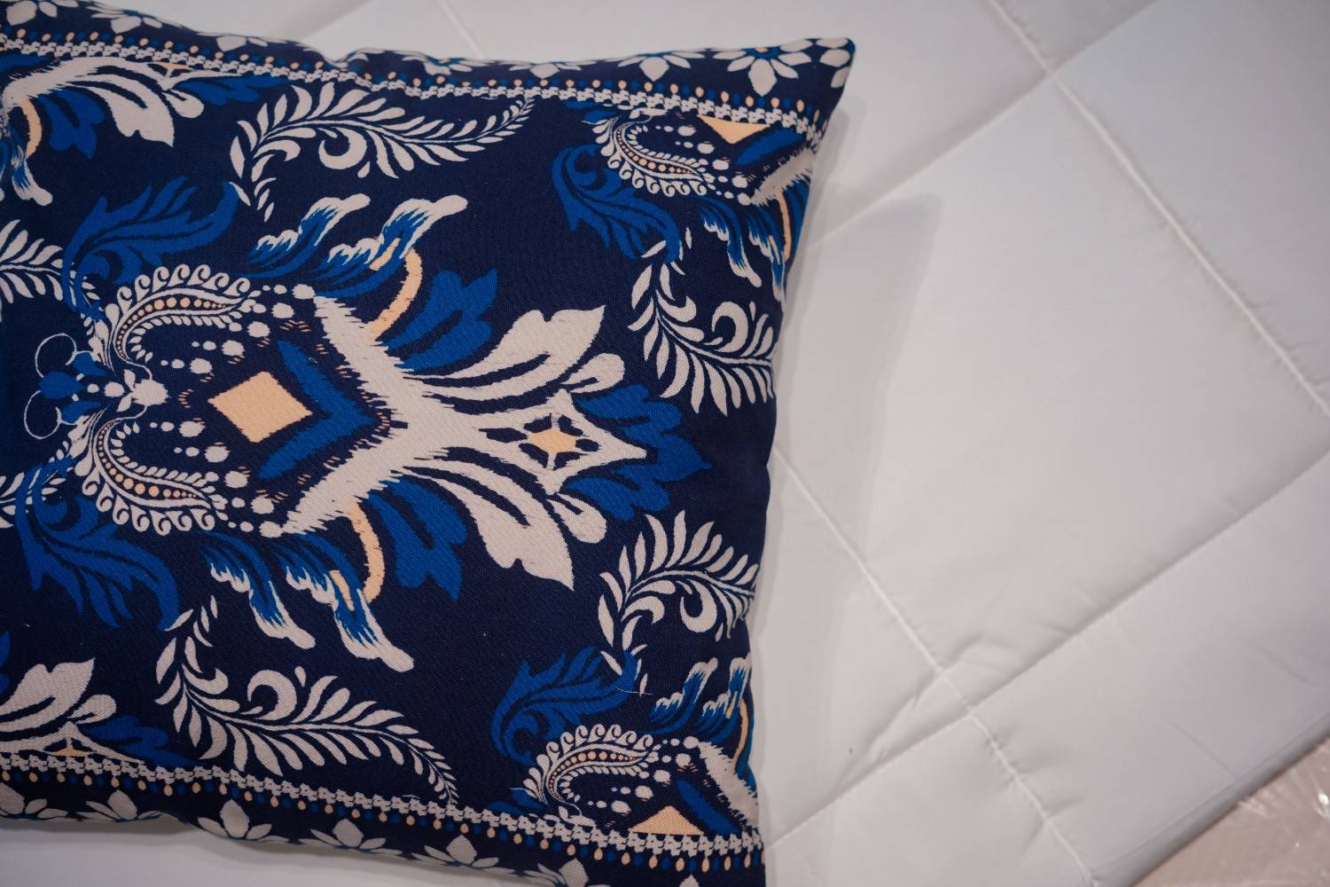 IndigoBloom Hand-Woven Ikat Cushion Cover – Artisanal Heritage Collection