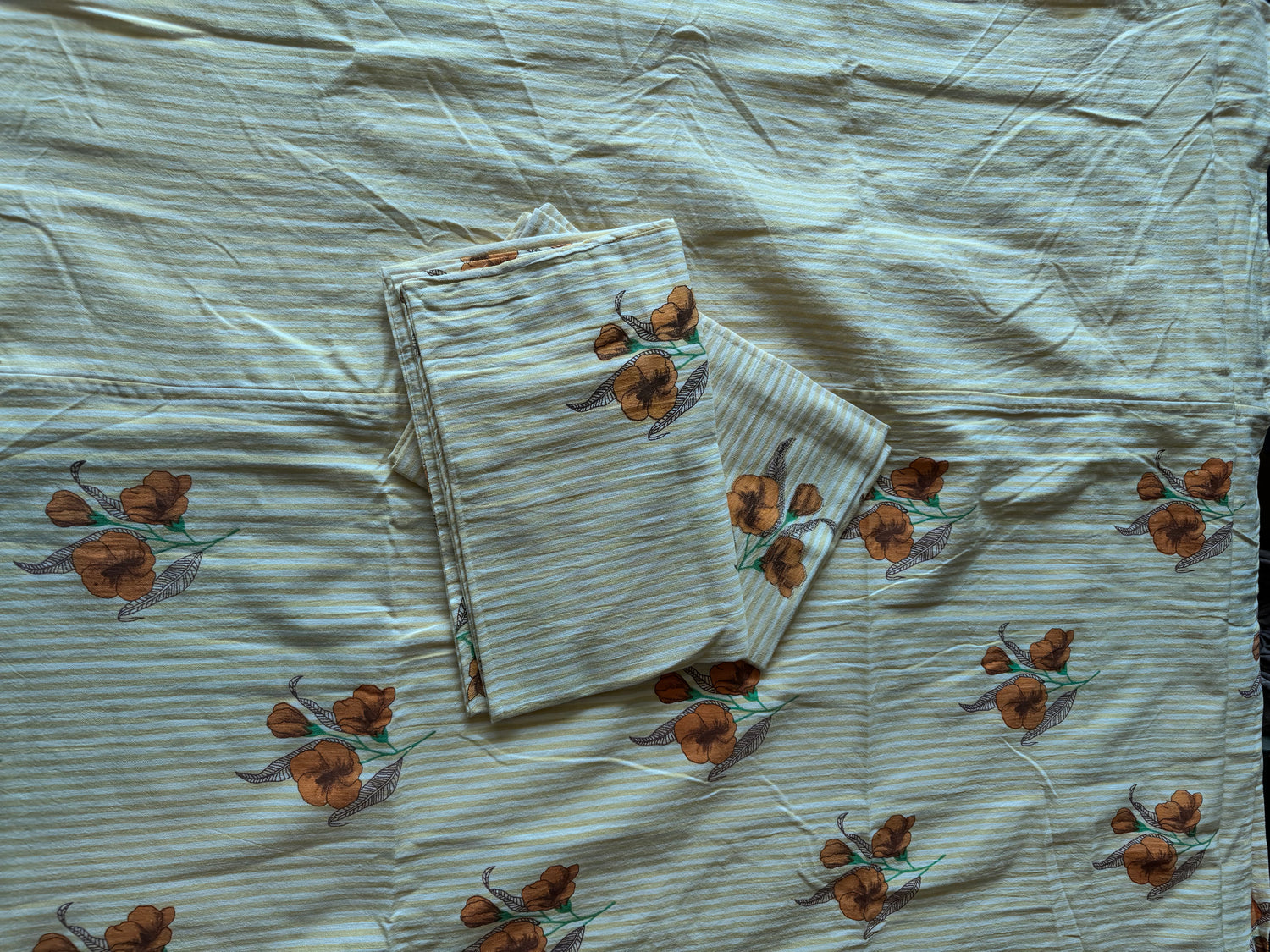 The Amber Blossom Border Bed Sheet set